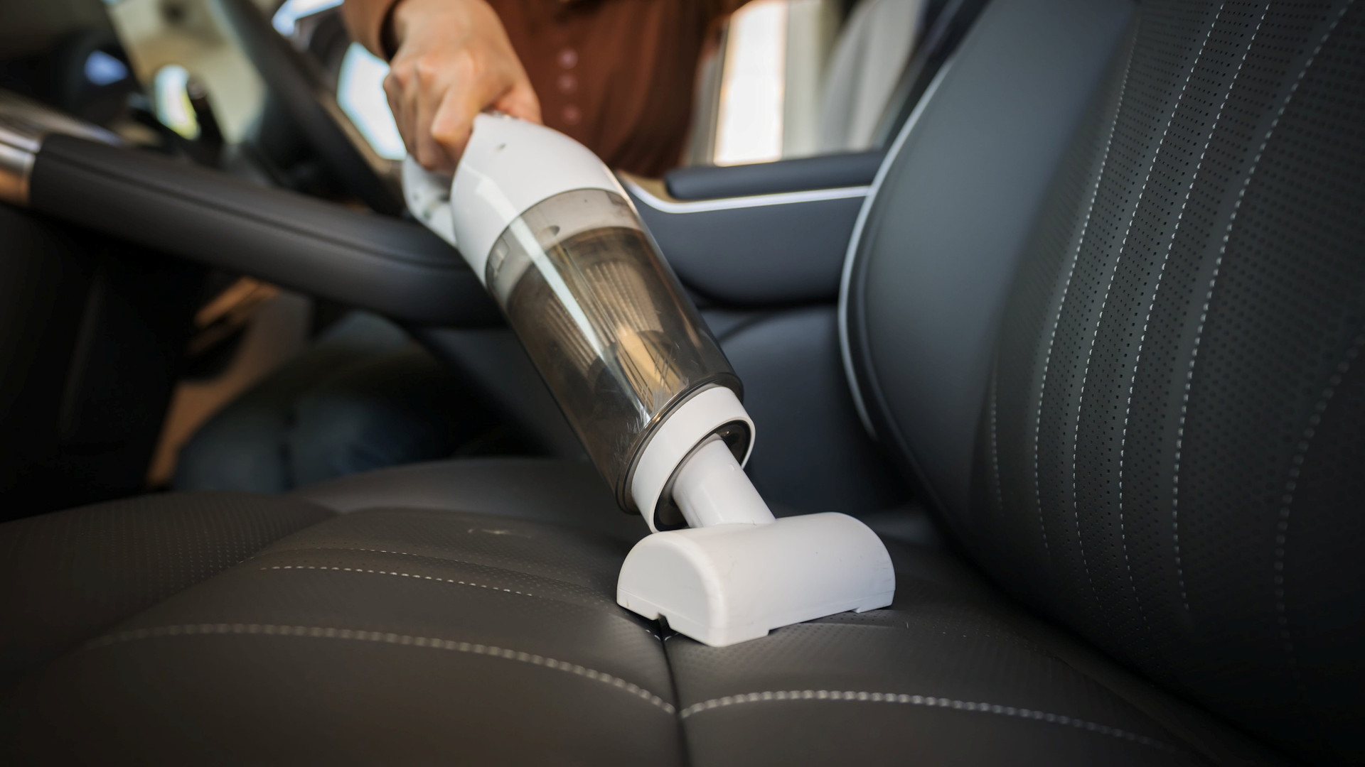 Cleaning with a hand held vacuum